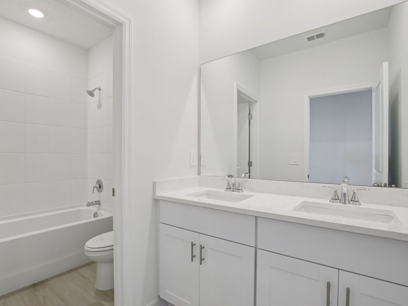 Furnished interior view inside a new home in Coasterra - Reserve Series, Palmetto (Image 8).