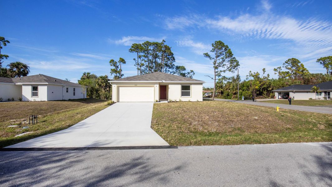 Representative exterior photo of a completed home built from the Violet by Maronda Homes in Coastal Communities, Edgewater, FL (Image 21).