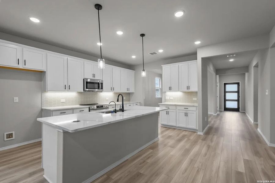 Furnished interior view inside a new home in Comanche Ridge, San Antonio (Image 6). Furnished interior view inside a new home in Comanche Ridge, San Antonio (Image 6).