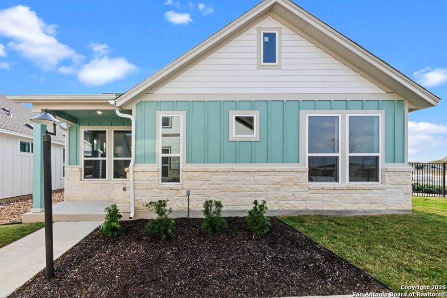 Front exterior of a new home in , New Braunfels, TX, highlighting curb appeal (Image 2).