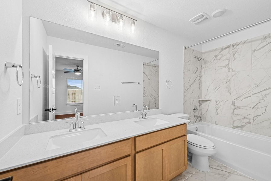 Furnished interior view inside a new home in Sorella, Tomball (Image 6).