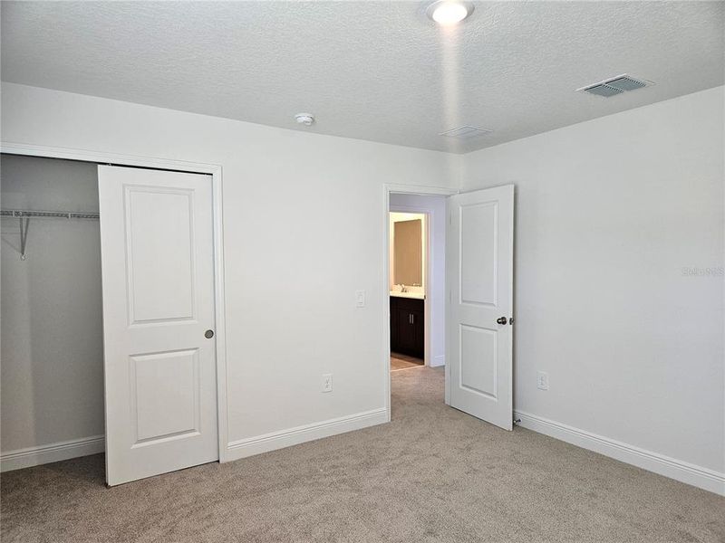 Spacious, unfurnished interior of a new home in The Reserve at Hammock Oaks - Classic Series, Lady Lake (Image 24).