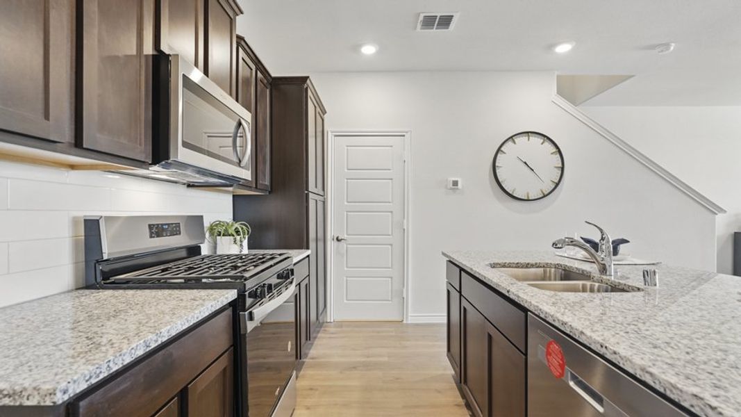 Furnished interior view inside a new home in Liberty Crossing, Royse City (Image 10).