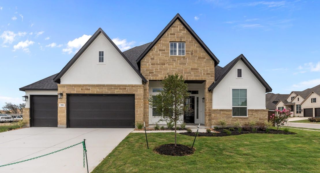 Representative exterior photo of a completed home built from the Brisbane 77′ by Chesmar Homes in Mesa Western, Cibolo, TX (Image 12).