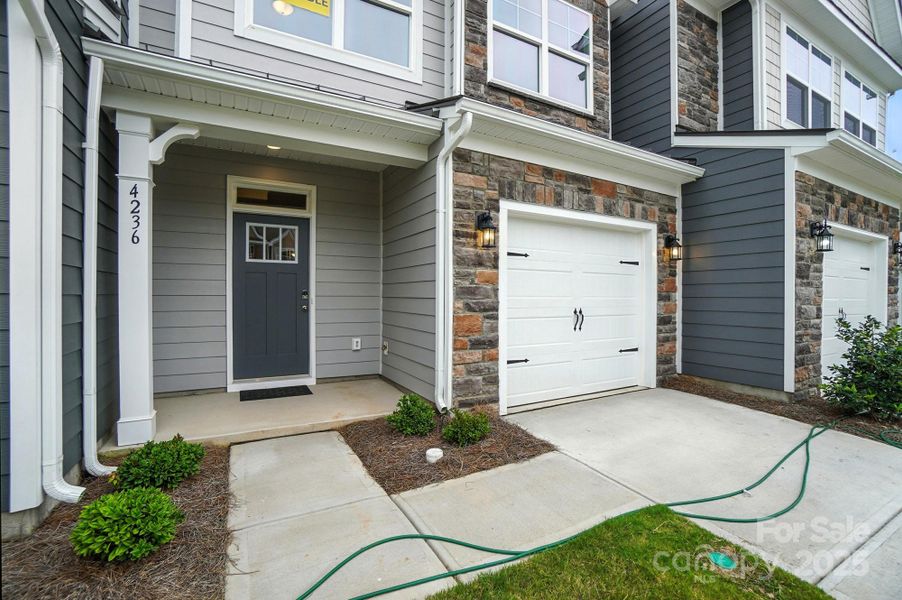 Front exterior of a new home in Harrisburg Village, Harrisburg, NC, highlighting curb appeal (Image 22). Front exterior of a new home in Harrisburg Village, Harrisburg, NC, highlighting curb appeal (Image 22).