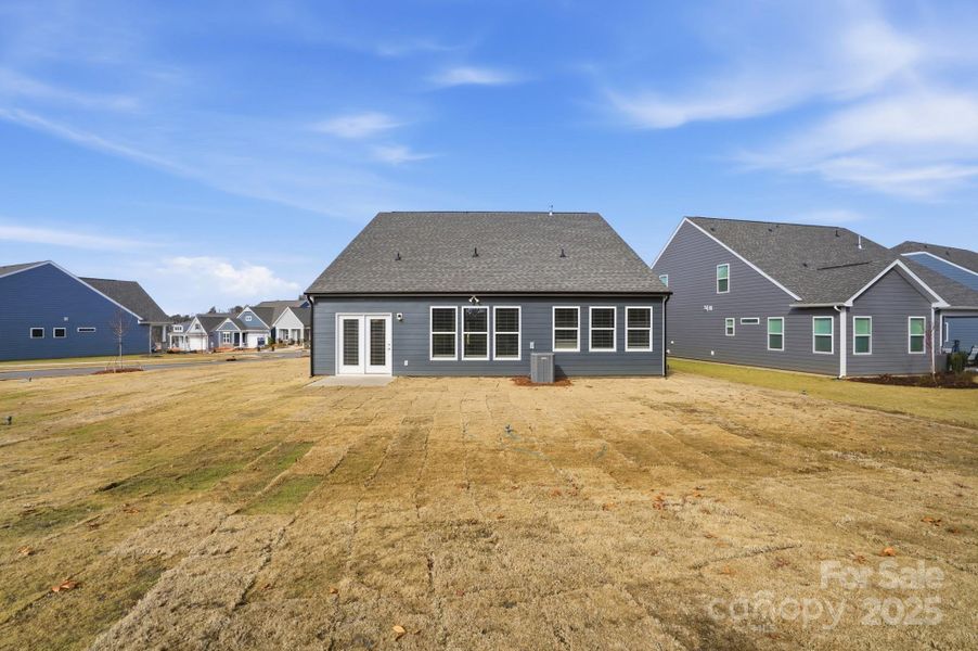 Exterior details and patio area of a home in Villas at Prestwick, Mooresville (Image 4).
