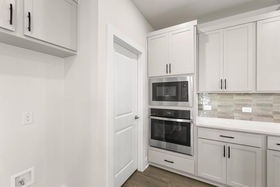 Furnished interior view inside a new home in The Retreat at Harvest, Argyle (Image 9). Furnished interior view inside a new home in The Retreat at Harvest, Argyle (Image 9).