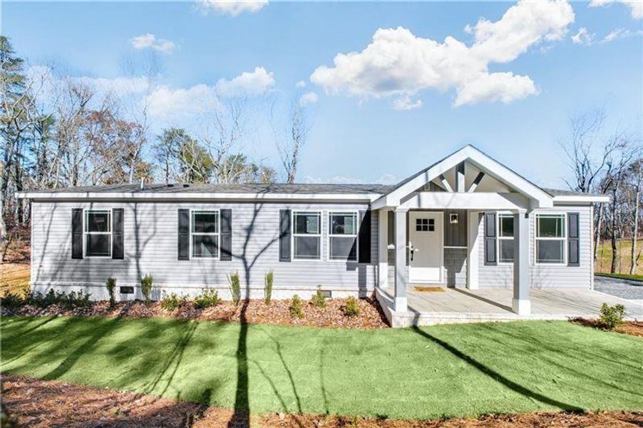 Front exterior of a new home in , Ball Ground, GA, highlighting curb appeal (Image 18).