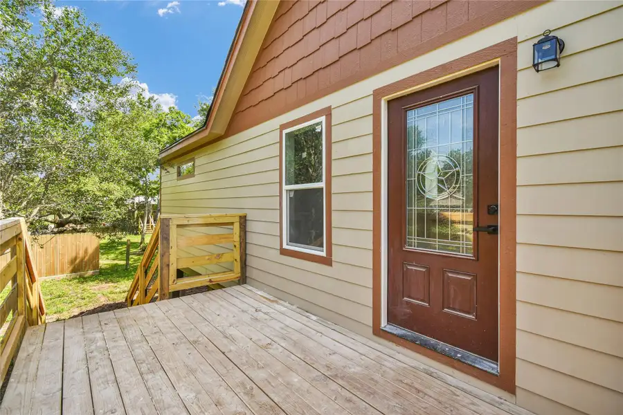 Exterior details and patio area of a home in , Brazoria (Image 14).
