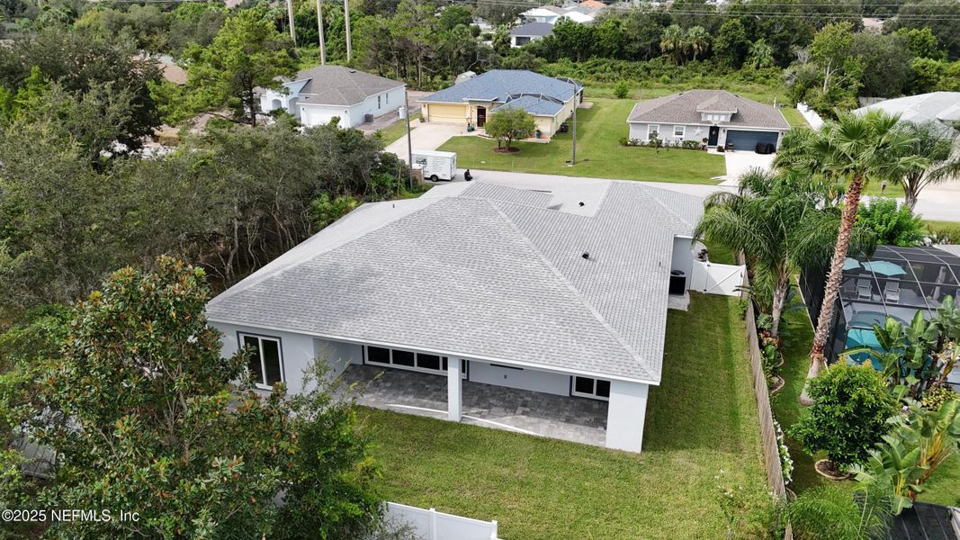 Front exterior of a new home in , Palm Coast, FL, highlighting curb appeal (Image 38). Front exterior of a new home in , Palm Coast, FL, highlighting curb appeal (Image 38).