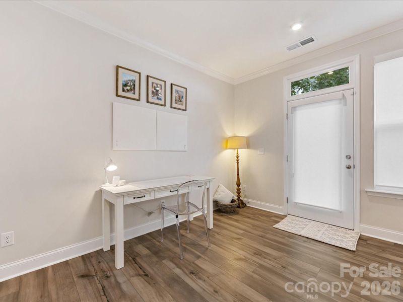 This space provides an ideal spot for an extra home office desk.