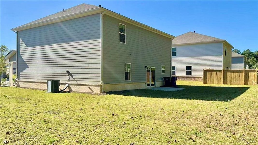 Exterior details and patio area of a home in Watson Farms, Loganville (Image 3). Exterior details and patio area of a home in Watson Farms, Loganville (Image 3).