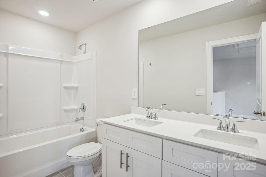 Photo is not of the actual home, but is an inspirational photo of builder’s model home and may depict options, furnishings, and/or decorator features that are not included