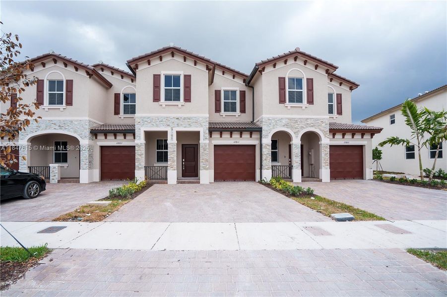 Front exterior of a new home in , Miami, FL, highlighting curb appeal (Image 2). Front exterior of a new home in , Miami, FL, highlighting curb appeal (Image 2).