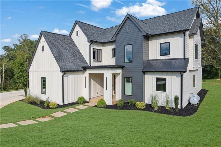 Front exterior of a new home in , Canton, GA, highlighting curb appeal (Image 30).