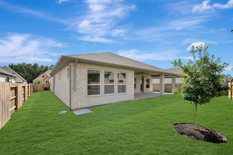 Exterior details and patio area of a home in ARTAVIA - Parkview Collection, Conroe (Image 27).