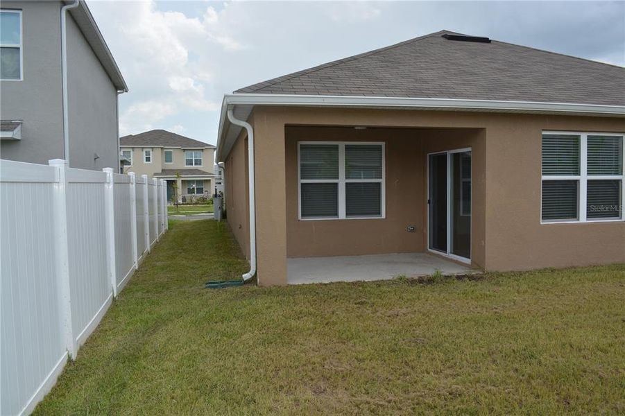 Front exterior of a new home in , Lakeland, FL, highlighting curb appeal (Image 1).