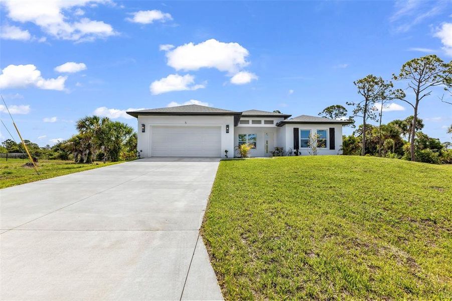 Front exterior of a new home in , Placida, FL, highlighting curb appeal (Image 30).