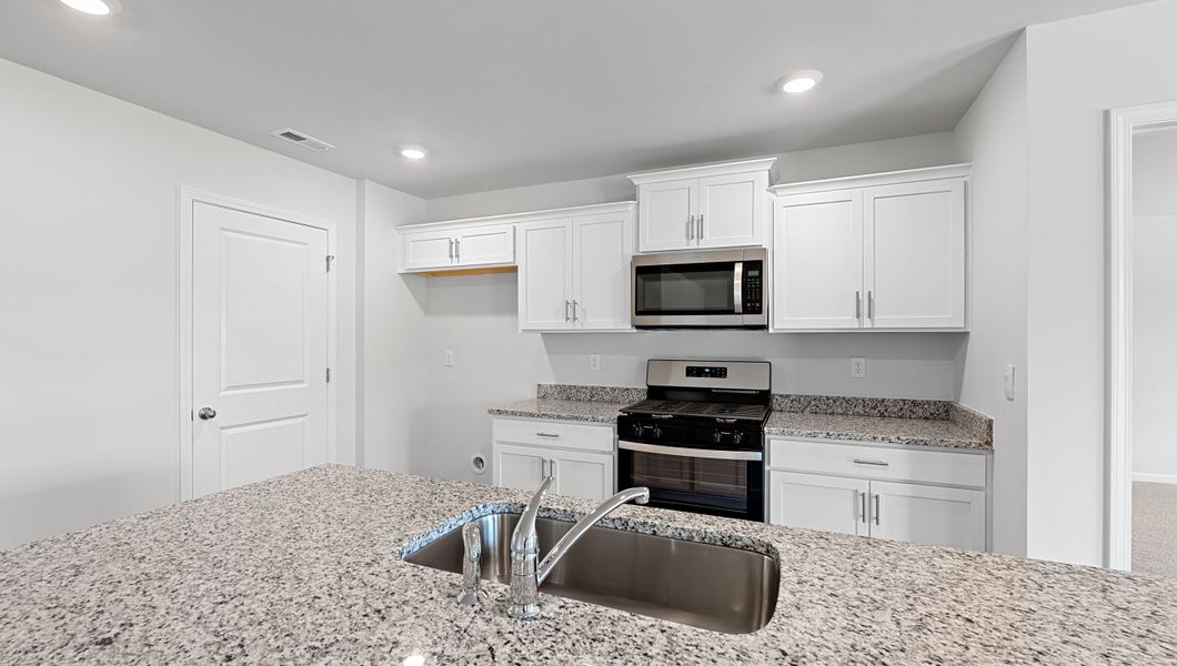 Furnished interior view inside a new home in Lightwood Cottages, Moore (Image 10).