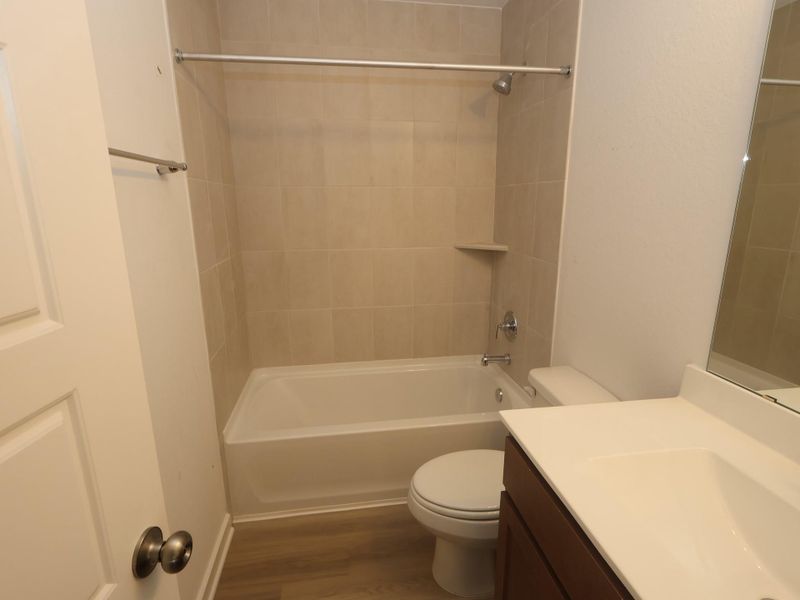 Furnished interior view inside a new home in Pinewood at Grand Texas, New Caney (Image 13).