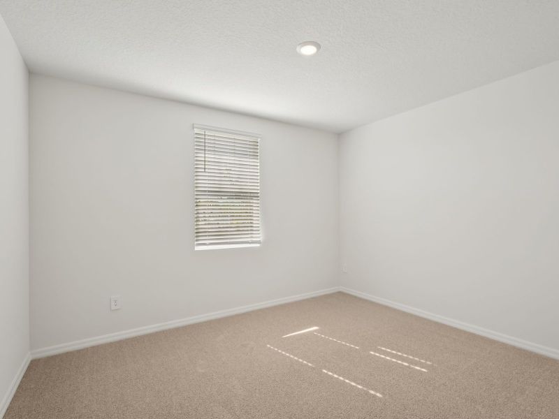 Spacious, unfurnished interior of a new home in The Reserve at Van Oaks, Auburndale (Image 11).