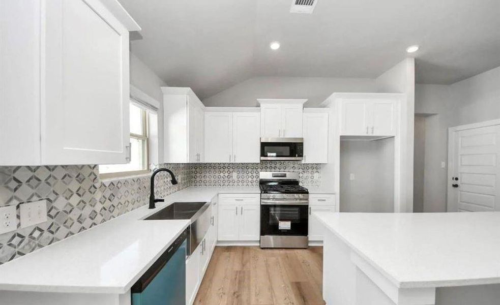 Furnished interior view inside a new home in , Manvel (Image 6).