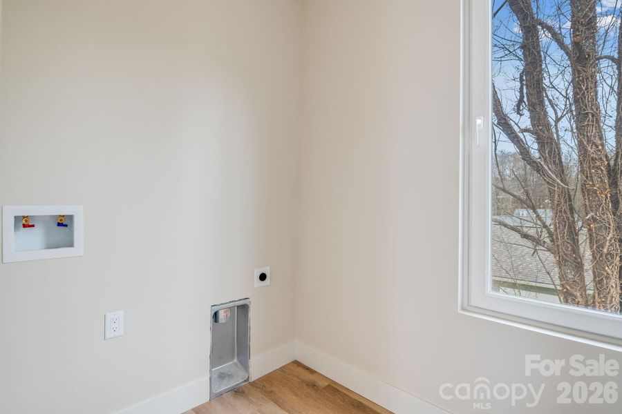 Spacious, unfurnished interior of a new home in , Black Mountain (Image 24).