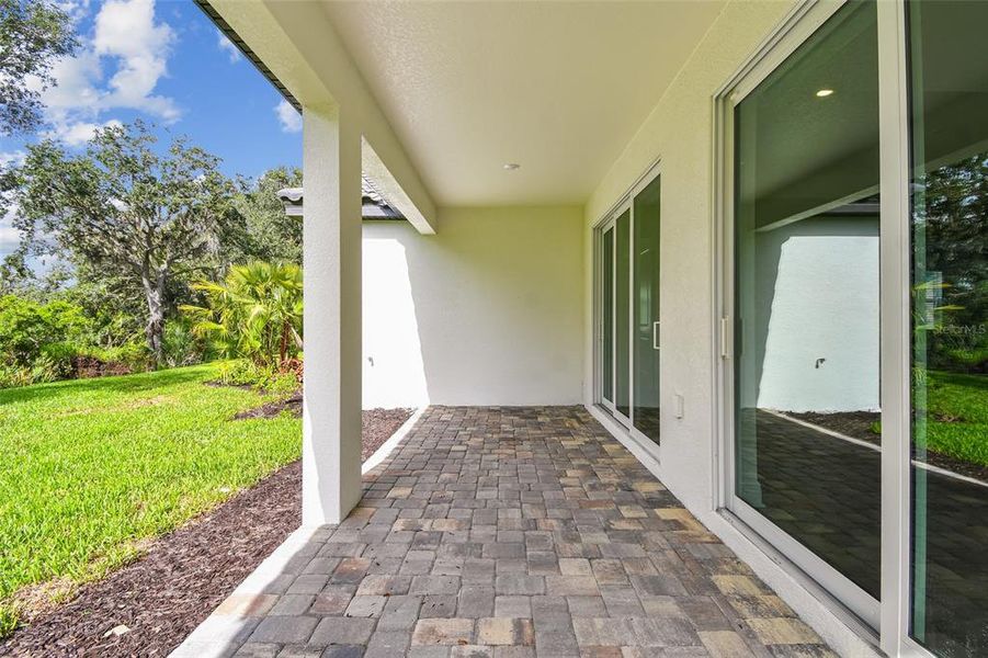 Exterior details and patio area of a home in Grand Park, Sarasota (Image 2). Exterior details and patio area of a home in Grand Park, Sarasota (Image 2).