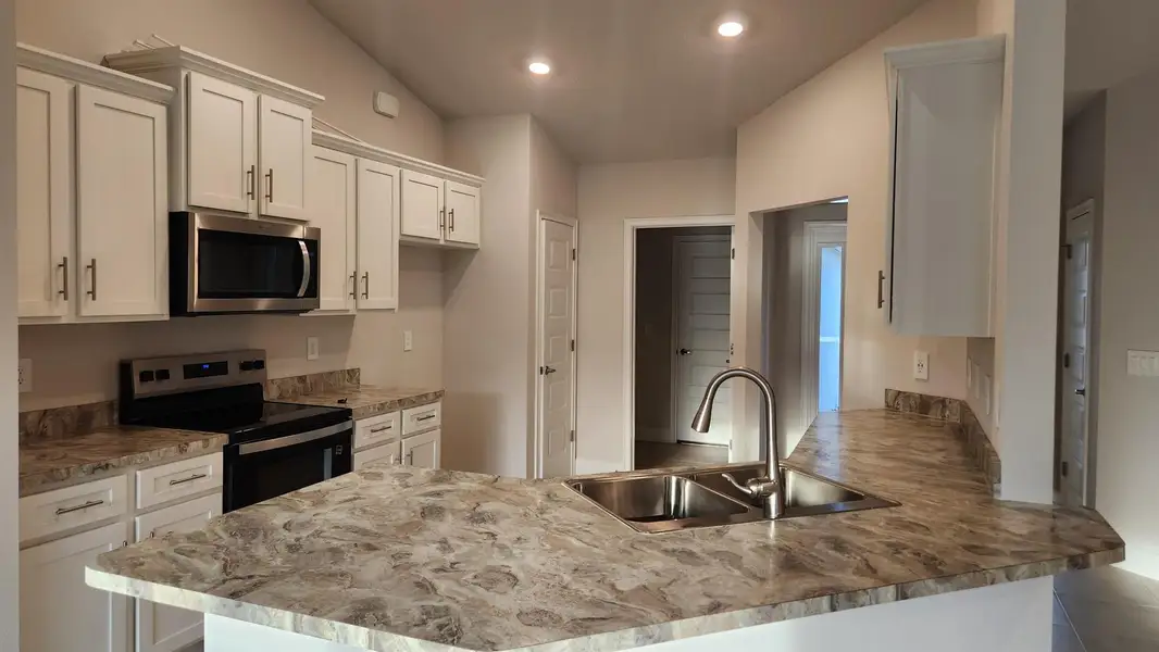 Furnished interior view inside a new home in Gatlin, Port St. Lucie (Image 9).