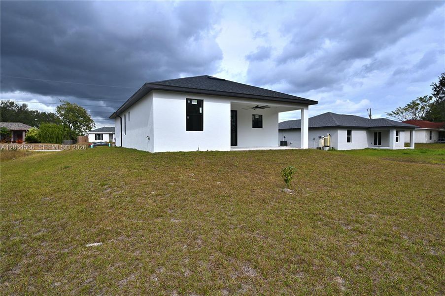 Exterior details and patio area of a home in , Lehigh Acres (Image 3). Exterior details and patio area of a home in , Lehigh Acres (Image 3).