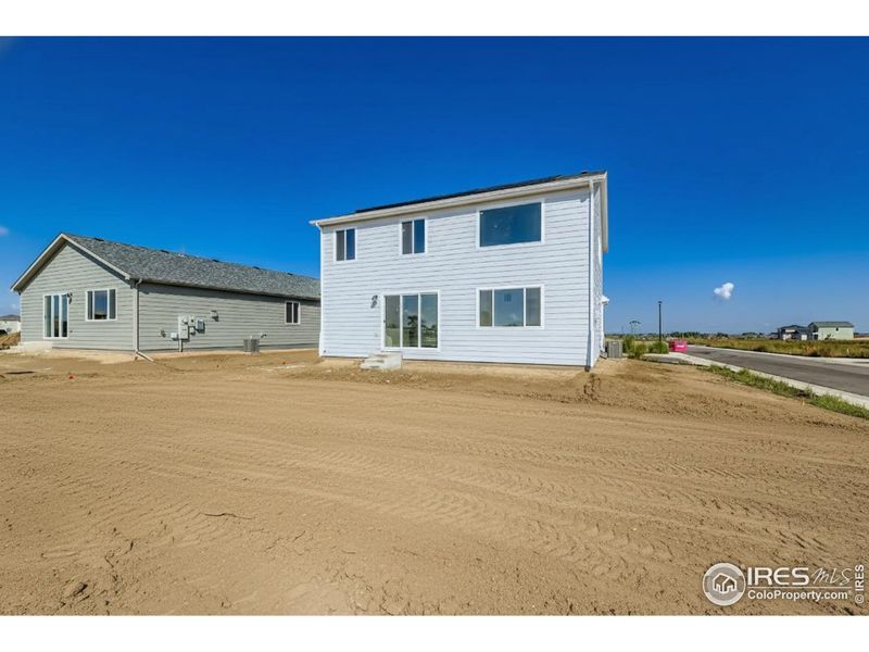 Exterior details and patio area of a home in Hidden Creek, Frederick (Image 4).