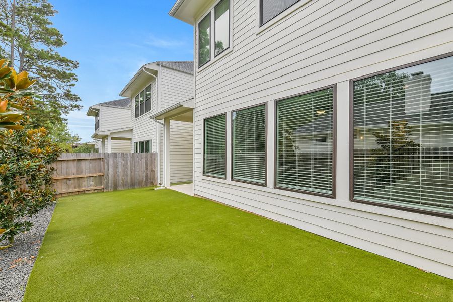 Exterior details and patio area of a home in Summer Place  35', Montgomery (Image 26).