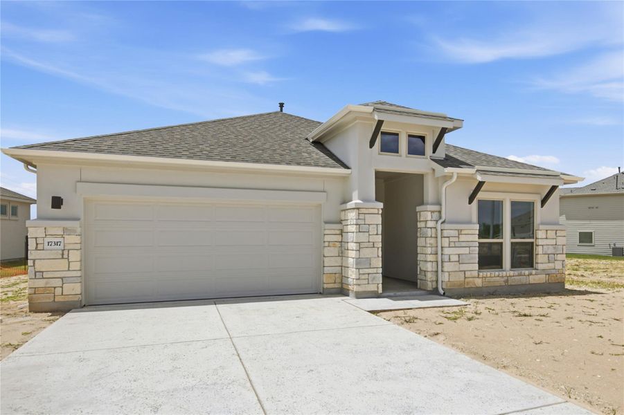 Front exterior of a new home in Preserve at Lakeside Meadows, Pflugerville, TX, highlighting curb appeal (Image 21).
