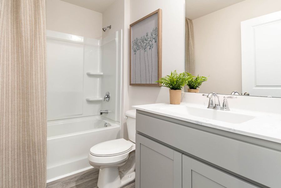 Representative furnished interior of a home built from the HELENA by D.R. Horton in Jordanville Farms, Galivants Ferry (Image 12).