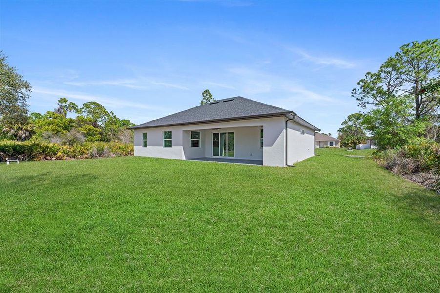 Exterior details and patio area of a home in , North Port (Image 18).