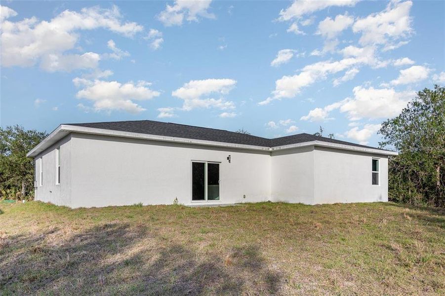 Exterior details and patio area of a home in , Port Charlotte (Image 2).