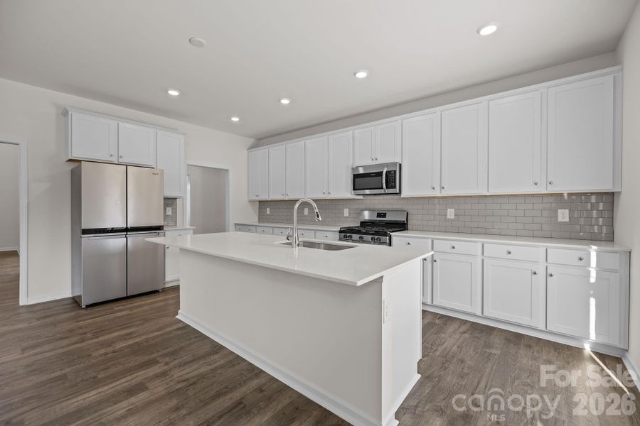 Furnished interior view inside a new home in McFarland Estates, York (Image 10).