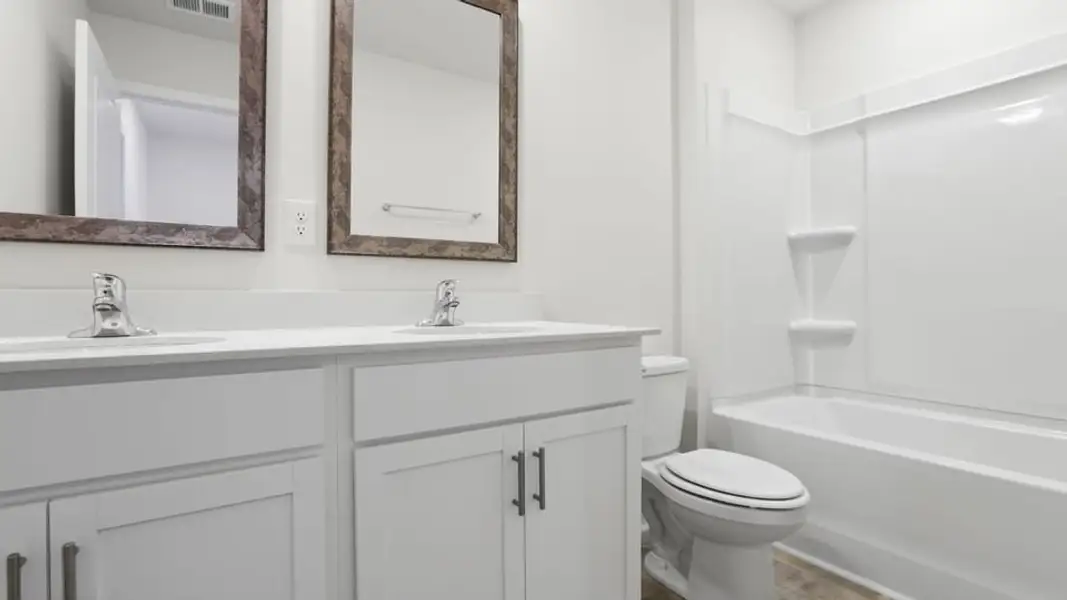 Furnished interior view inside a new home in Durbin Meadows Traditions, Fountain Inn (Image 11).