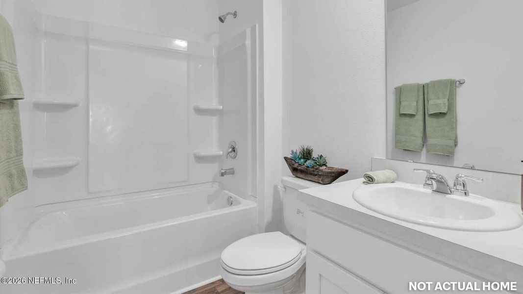 Furnished interior view inside a new home in Grand Reserve, Bunnell (Image 9).