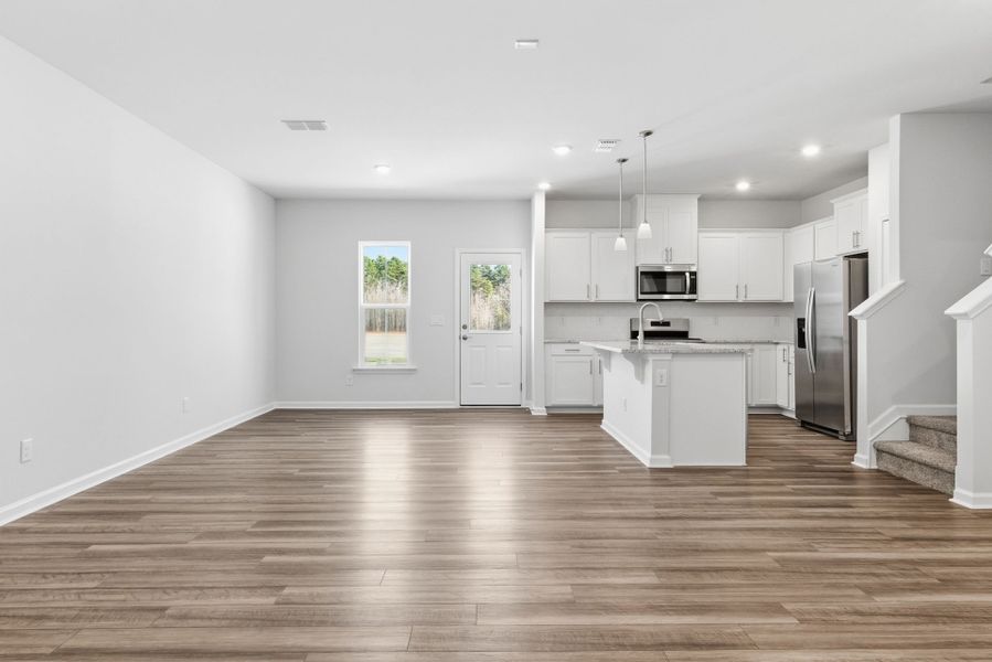 Spacious, unfurnished interior of a new home in Poets Walk, Whitsett (Image 14).