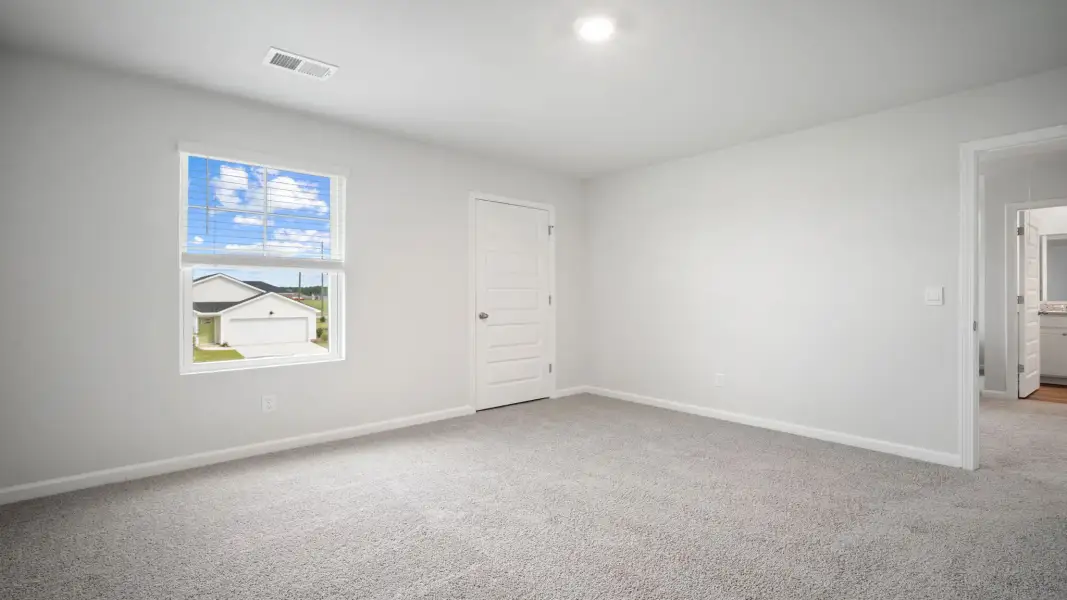 Spacious, unfurnished interior of a new home in The Retreat at East Argent, Ridgeland (Image 22).