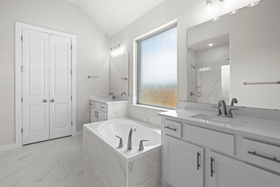 Primary Bath retreat with dual vanities & garden tub