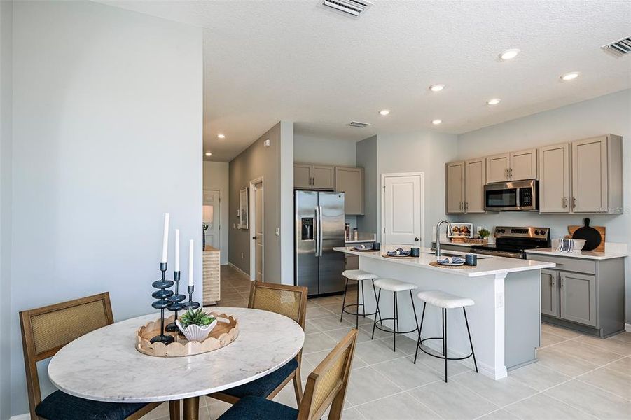 Furnished interior view inside a new home in Waterstone Townhomes, Groveland (Image 12). Furnished interior view inside a new home in Waterstone Townhomes, Groveland (Image 12).