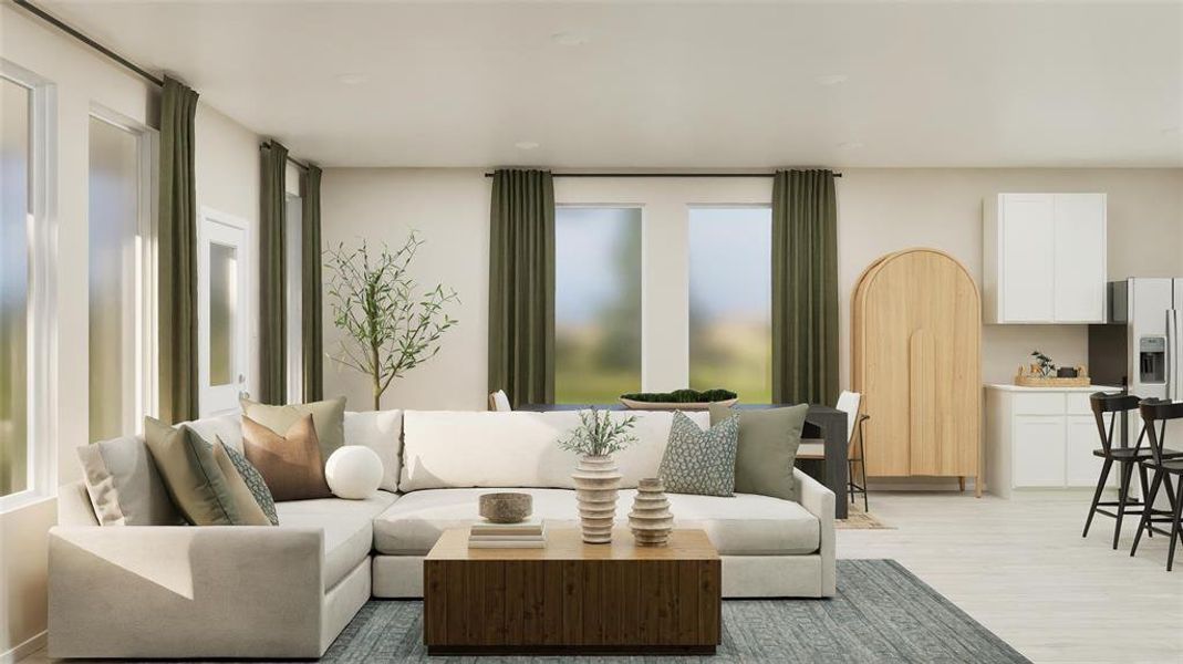 Living area with light wood-style floors