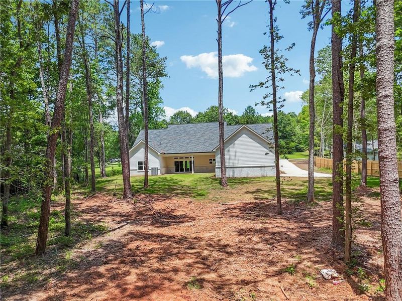 Front exterior of a new home in , Monroe, GA, highlighting curb appeal (Image 24). Front exterior of a new home in , Monroe, GA, highlighting curb appeal (Image 24).