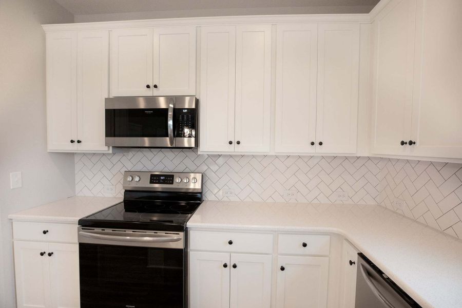 Representative furnished interior of a home built from the Drayton by Caviness & Cates Communities in Bartlett Manor, Youngsville (Image 166).