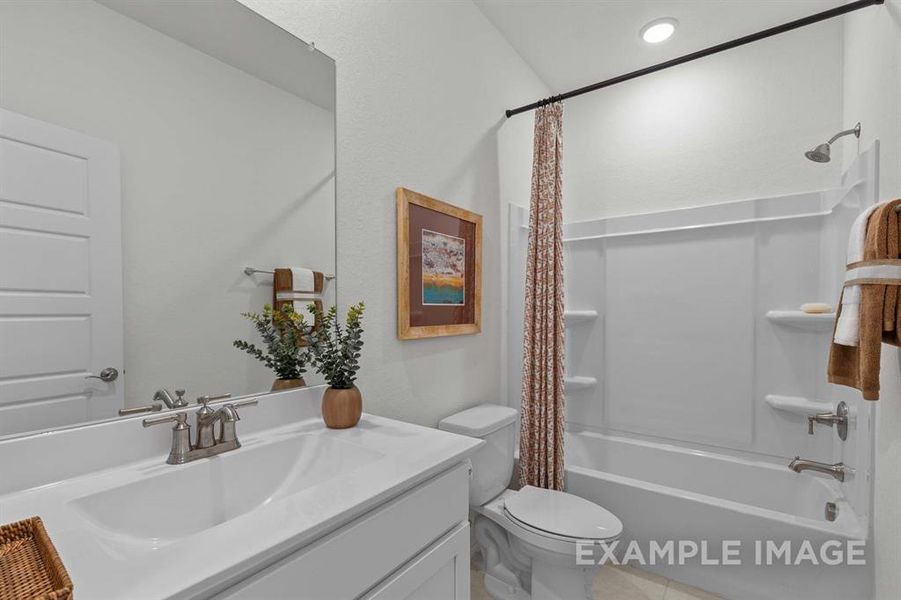 Full bathroom with vanity, toilet, and shower / tub combo