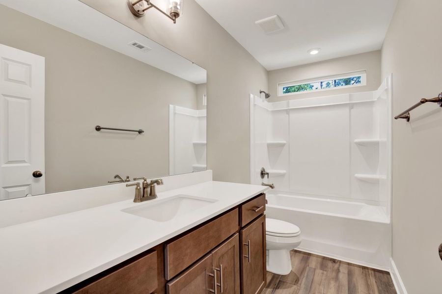 New Haven Townhomes A Upstairs Modern Full Bathroom with Tub/Shower Combo | Ernest Homes