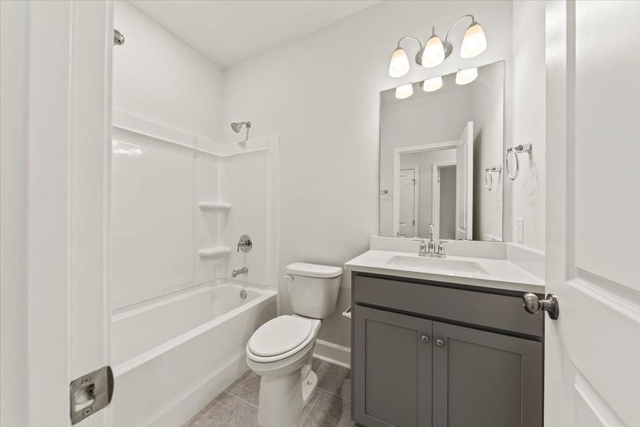 Secondary bathroom with soaking tub and shower Secondary bathroom with soaking tub and shower