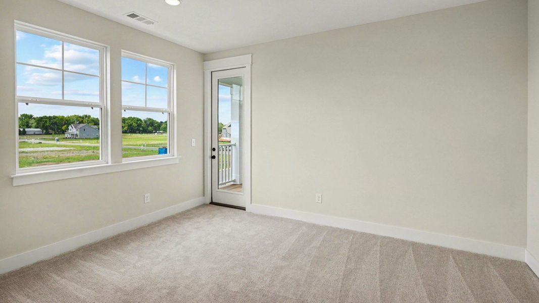 Primary suite flex space with windows Primary suite flex space with windows